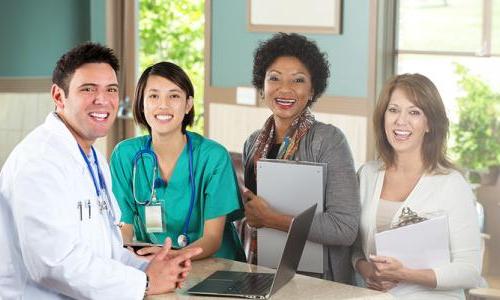 Public Health Nursing Team Smiling in Clinic Office